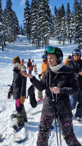 Skiiers and snowboarders on the slopes